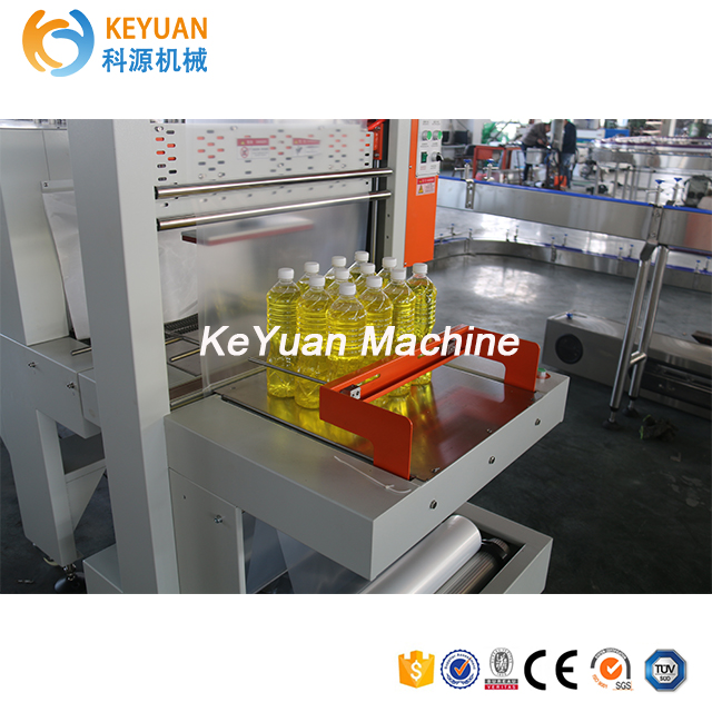 KeYuan Manual Type Mineral Water pet Bottle PE Film Heat Tunnel Shrink Packing Machine Shrink Wrapping Machine