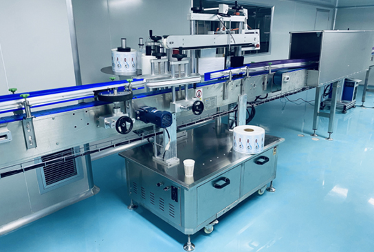 Adhesive sticker labeling machine